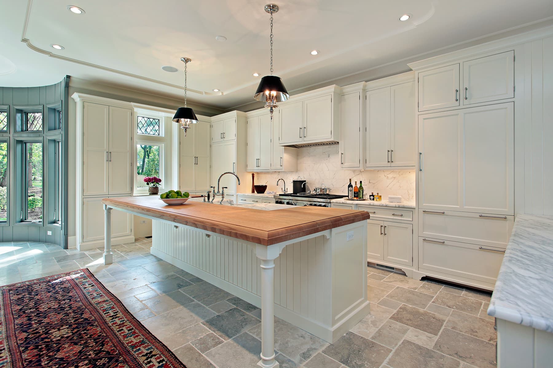 Traditional kitchen with a butcher-block island